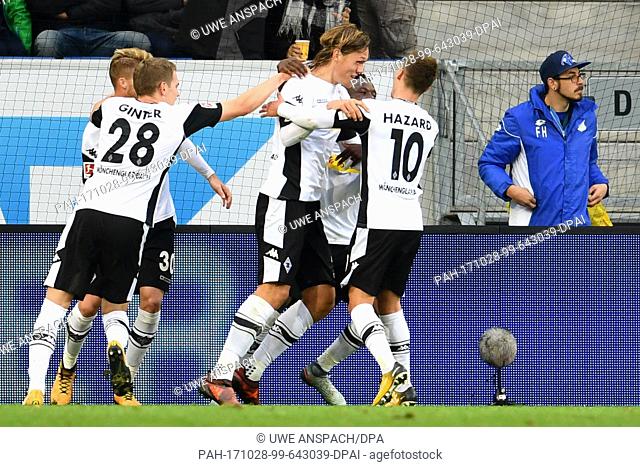 Gladbach's Jannik Vestergaard (c) celebrates after his goal for 1:3 with teammates during the Bundesliga soccer match between 1899 Hoffenheim and Borussia...