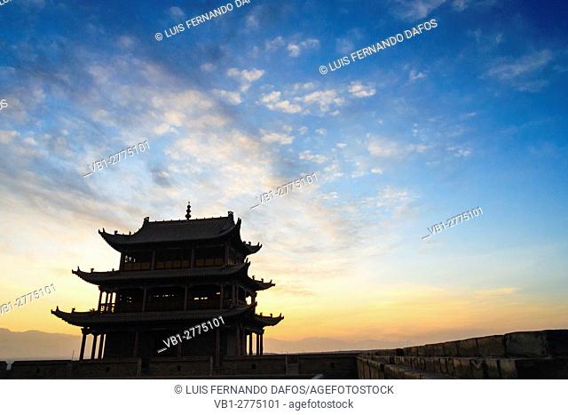 Jiayuguan fort at dusk at the western boundary of the Great Wall of China, Gansu province, China, Asia The pass was a key waypoint of the ancient Silk Road