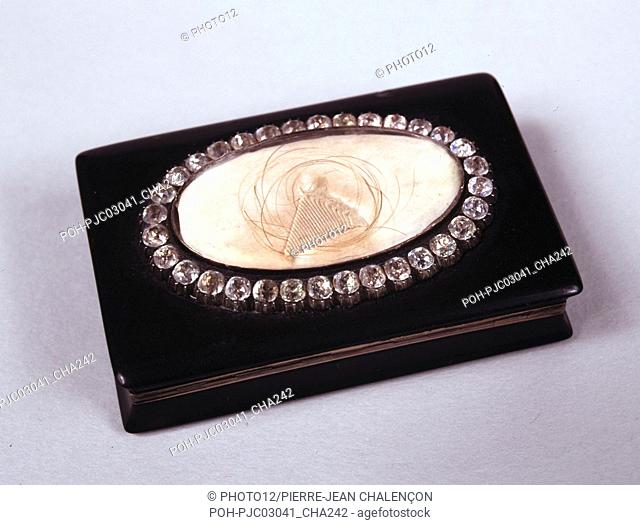 Emperor's snuffbox at St. Helena. The central medallion contains a lock of hair of the Emperor and a piece of his sash of the Legion of Honour Vermeil