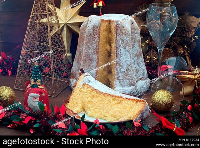 Pandoro, typical Italian Christmas cake with butter and powdered sugar, italy