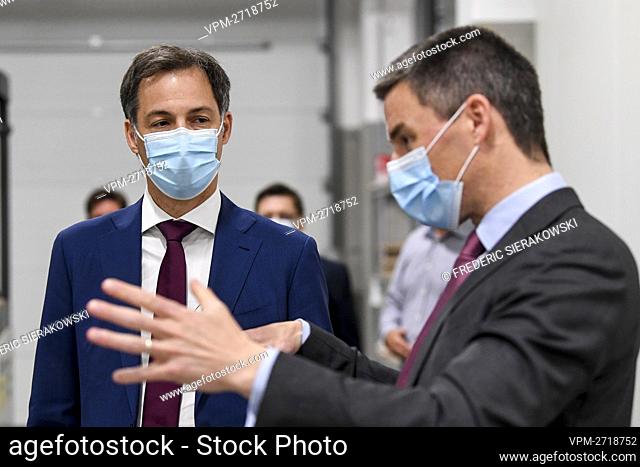 Prime Minister Alexander De Croo and managing director Bruno Ranson pictured during a visit to the Ranson company, wholesaler for bakery products in Harelbeke