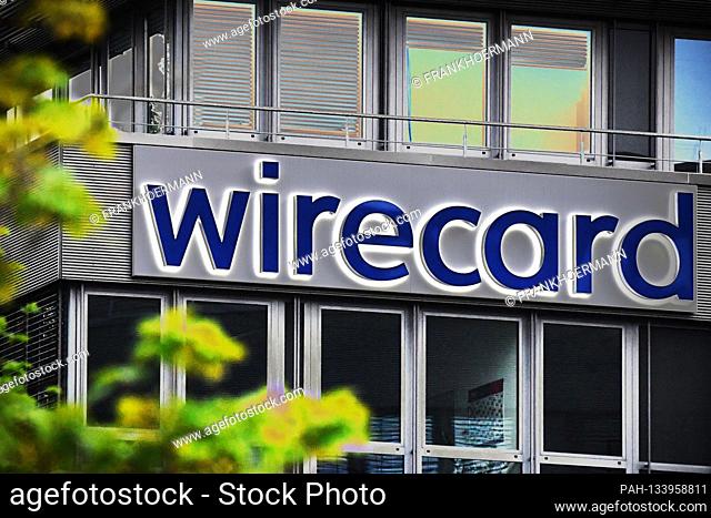 ALIENATION! Evening mood at the headquarters of wirecard AG in Aschheim Dorafter. wirecard logo, company emblem, lettering, building, facade
