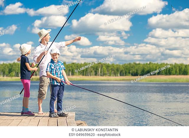 girl and boy with dad learn to fish, weekend fishing