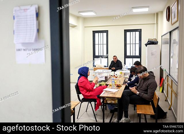 TURKEY, ISTANBUL - MAY 28, 2023: People are seen at a polling station in Saffet Cebi Middle School during a runoff between incumbent president Erdogan of...