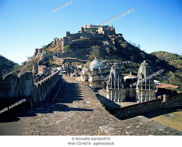 Foreground paved battlements, temples and Badal Mahal Cloud Palace, Kumbalgarh Fort, Rajasthan state, India, Asia