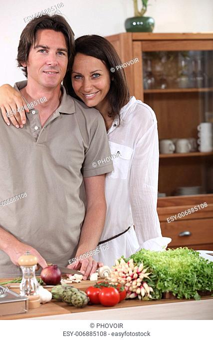 Couple preparing dinner in the kitchen
