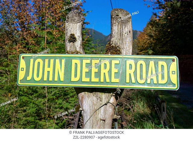 John Deere Road sign on a post