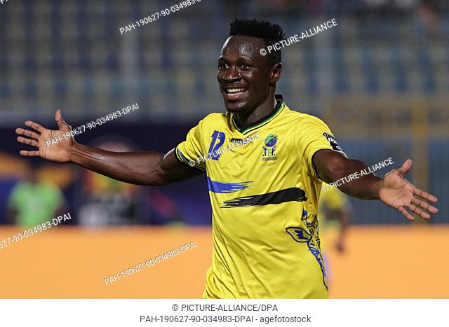 27 June 2019, Egypt, Cairo: Tanzania's Happygod Msuvan celebrate scoring his side's first goal during the 2019 Africa Cup of Nations Group C soccer match...