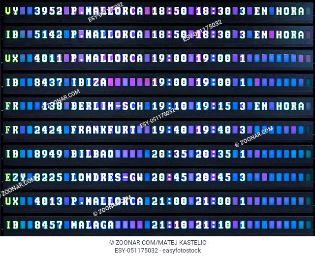 Colorful electronic airport departures or arivals board