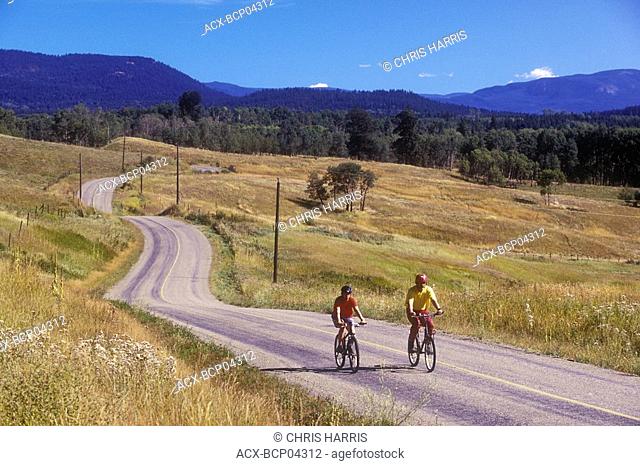 Cycling on back country road, Shuswap region, British Columbia, Canada