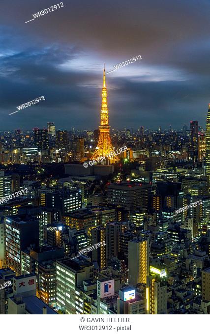 Elevated night view of the city skyline and iconic illuminated Tokyo Tower, Tokyo, Japan, Asia