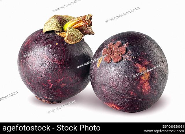 Two ripe mangosteen isolated on a white background