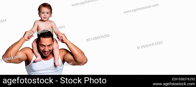 Panoramic photo loving strong muscular mixed race dad holding his little adorable cute daughter on shoulders isolated on white studio background
