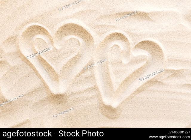 Travel, vacation, honey moon concept. Heart shapes on the sand. Love for two. High quality photo