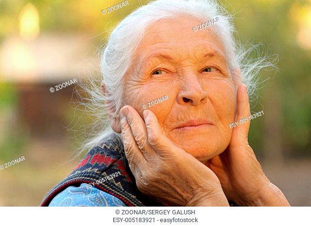 Portrait of the elderly woman