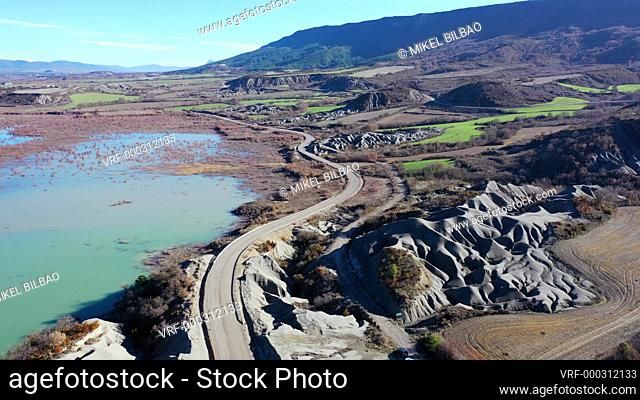 Road in Yesa reservoir shore. Saragossa, Aragon, Spain. Europe. Aerial view. 4K