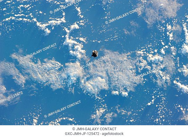 The Soyuz TMA-20 spacecraft approaches the International Space Station, carrying Russian cosmonaut Dmitry Kondratyev, Soyuz commander and Expedition 26 flight...