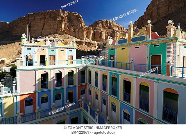 Colorful adobe Hotel Bait, Beit Bugshan, Khaylla, Khaylah village, Wadi Doan, Wadi Hadramaut, Yemen, Arabia, Southwest Asia