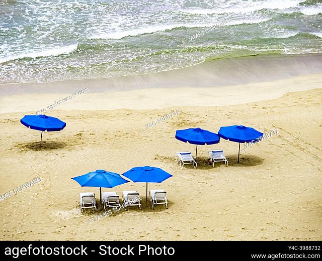 Umbrellas on Isla Verde Beach on the Atlantic Ocean in the Metropolitan Area of San Juan in Carolina Puerto Rico,