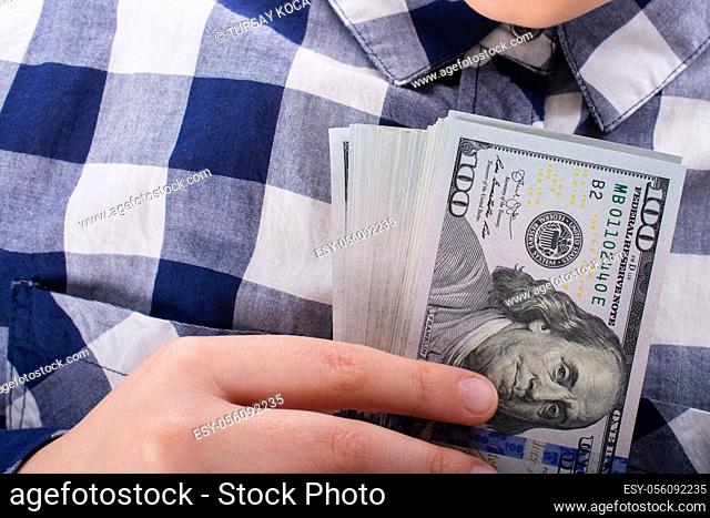 Hands holding USD dollar banknotes currencies as financial activity