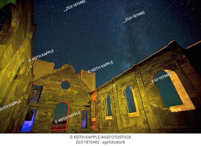 Old ruined mission at night with the Milky Way showing in southern Colorado, USA