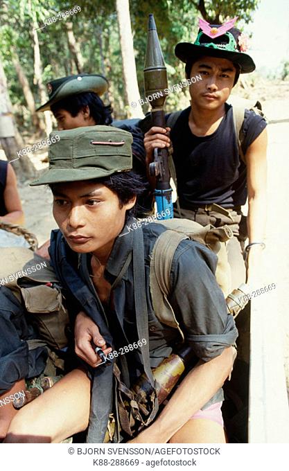 KNLA (Karen National Liberation Army) fighters on their way to the frontline. Kawthoolei (Karen State). East Myanmar