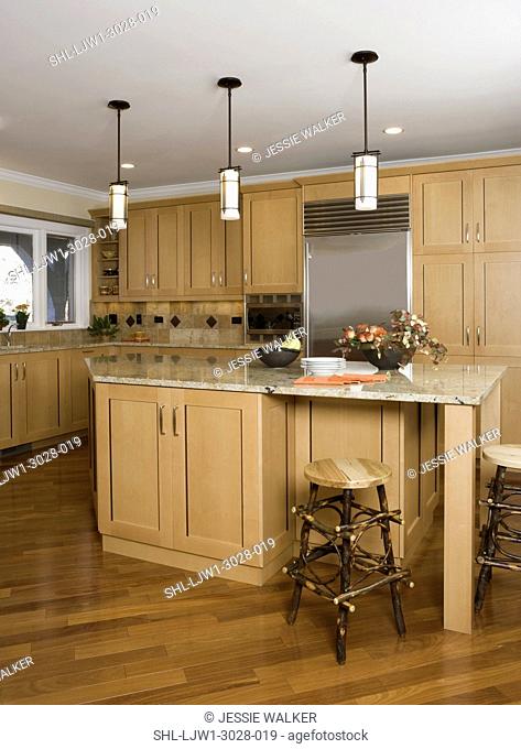 KITCHEN: contemporary mixed with Arts and Crafts, casual , kitchen island looking toward refrigerator, three pendant Craftsman style lights