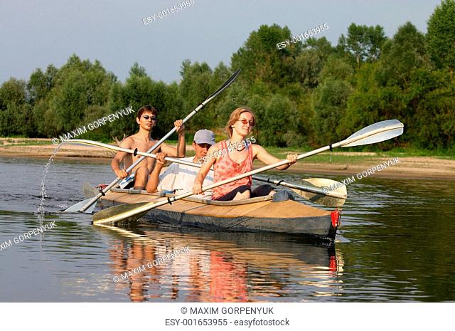 peoples on canoe