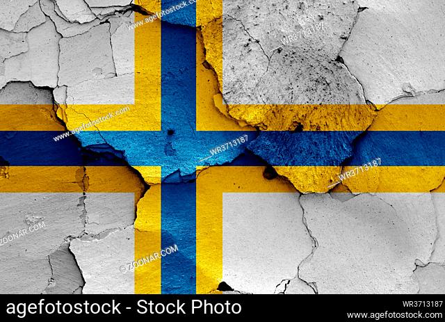 flag of Sweden Finns painted on cracked wall