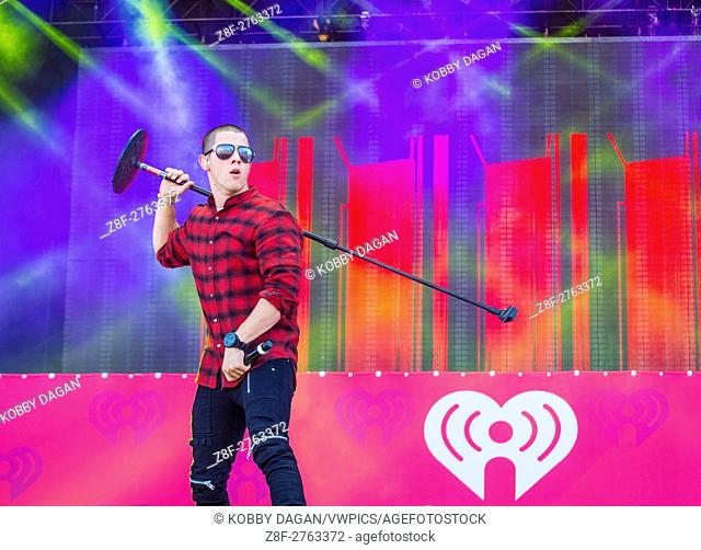 Singer Nick Jonas performs on stage at the 2015 iHeartRadio Music Festival at the Las Vegas Village in Las Vegas, Nevada