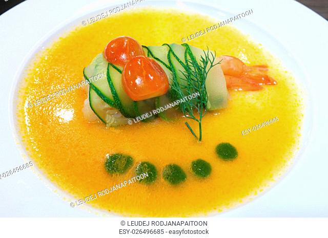 Shrimp rolled with cucumber in spicy sauce, fusion food