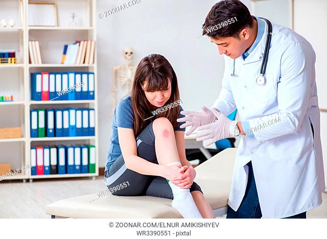 Patient visiting doctor after sustaing sports injury