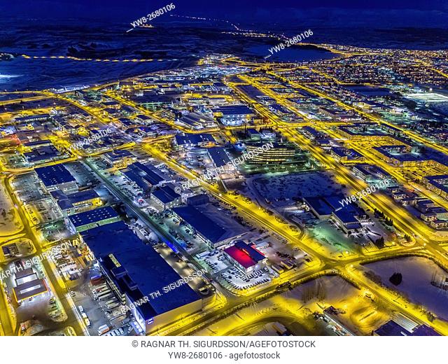 Top view of roads, homes, buildings at twilight, wintertime, Reykjavik, Iceland. This image is shot with a drone