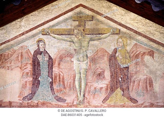 Fresco with the Crucifixion in the tympanum of the Church of St Anthony, Romeno, Trentino-Alto Adige, Italy, 15th century