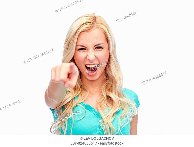 gesture, emotions, expressions and people concept - happy smiling young woman or teenage girl pointing finger to you