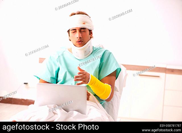 Young injured man staying in the hospital