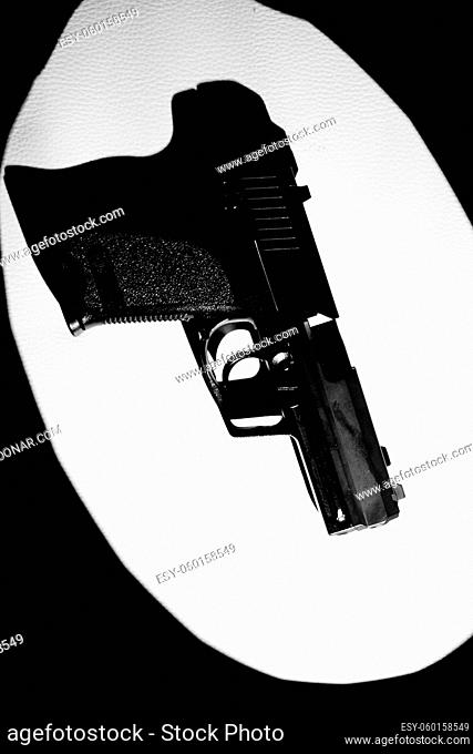 Automatic 9mm pistol gun crime thriller book cover design photo