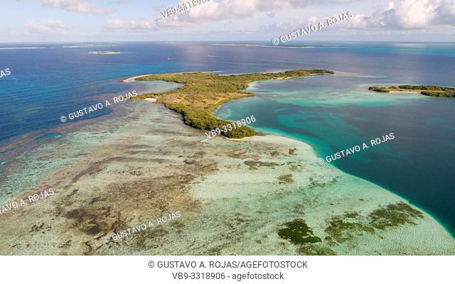 Aerial view Carenero Island Surrounded by crystal clear waters and beautiful beaches of fine white sand in the Caribbean Sea Los Roques Venezuela