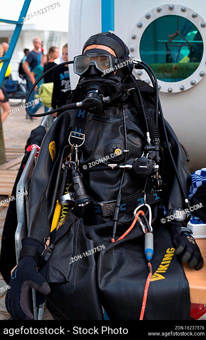 ROTTERDAM, NETHERLANDS - SEPTEMBER 3, 2017: Closeup of a professional diver's suit with equipment
