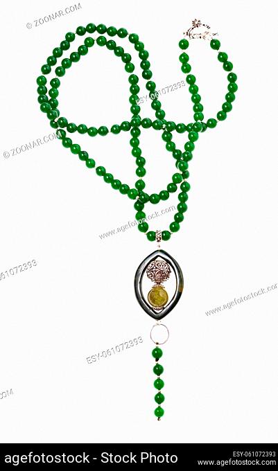 hand crafted necklace from green nephrite beads with pendant isolated on white background