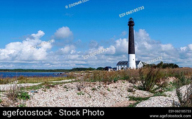 Saare, Estonia - 14 August, 2021: panorama view of the Sorve lighthouse on Saaremaa Island of Estonia