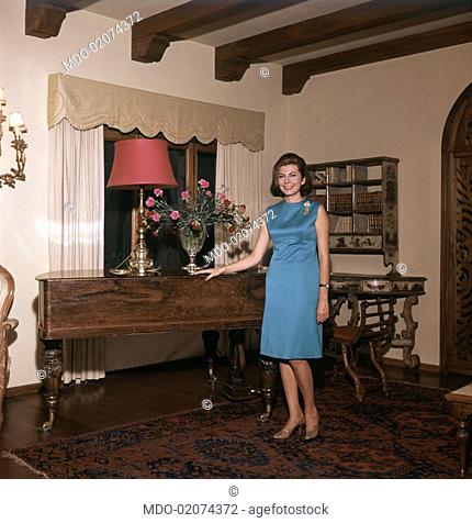Princess of Iran Soraya (born Soraya Esfandiary-Bakhtiari), the second wife and Queen Consort of the late Shah of Iran, is posing in front of a piano in the...