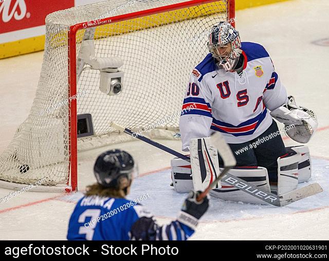 L-R Anttoni Honka (FIN) and goalkeeper Spencer Knight (USA) in action during the 2020 IIHF World Junior Ice Hockey Championships quarterfinal match between USA...