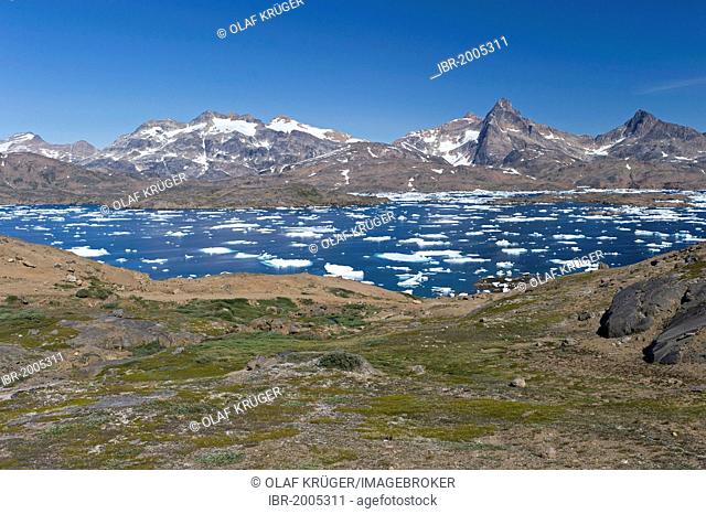 Floating ice sheets and mountains, Tasiilaq or Ammassalik, East Greenland, Greenland
