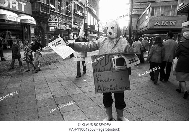 Masked members of the Social Democratic Party of Germany (SPD) are demonstrating for disarmament in Cologne on May 13, 1977