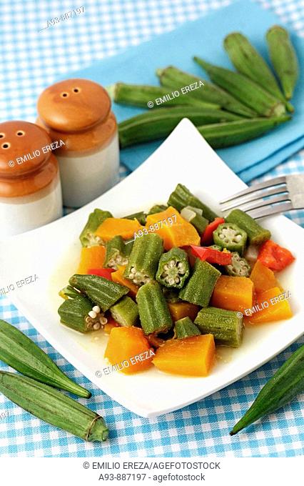 Okra cooked with pumpkin and pepper. Lady fingers. Hibiscus esculentus or Abelmoschus esculentus