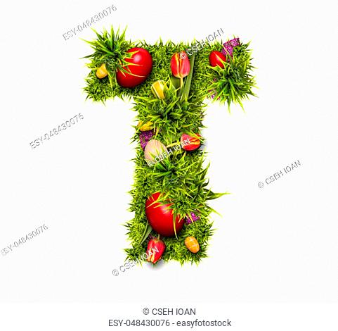 Easter holiday letter T made of fresh green grass and Easter eggs isolated on white background