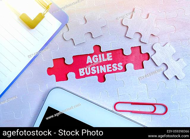 Text showing inspiration Agile Business, Concept meaning capability of adjusting quickly to the market s is trend Building An Unfinished White Jigsaw Pattern...