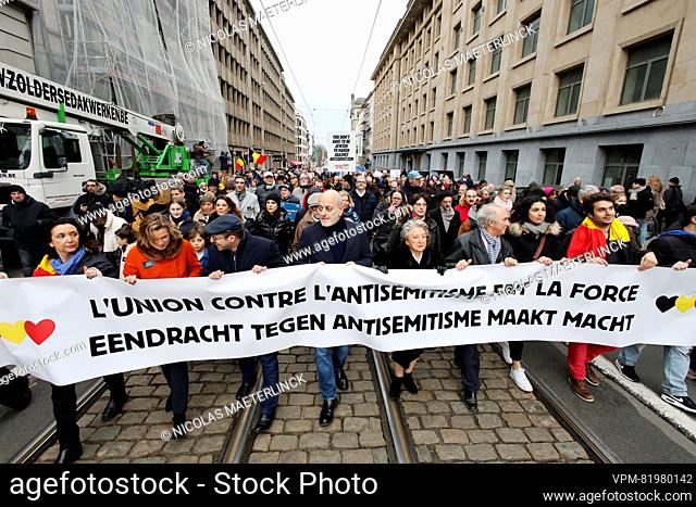 People gather for a national march against antisemitism organized by the CCOJB coordination of Jewish organization in Belgium