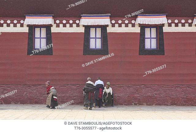 Pilgrims doing kora at Kerti Gompa, Langmusi, Gansu, China